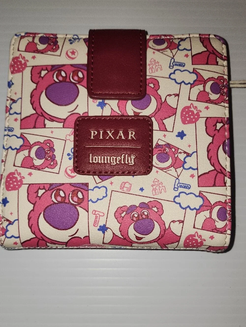 Loungefly Pixar Lotso All-Over-Print Snap Wallet. NWT. 5×5